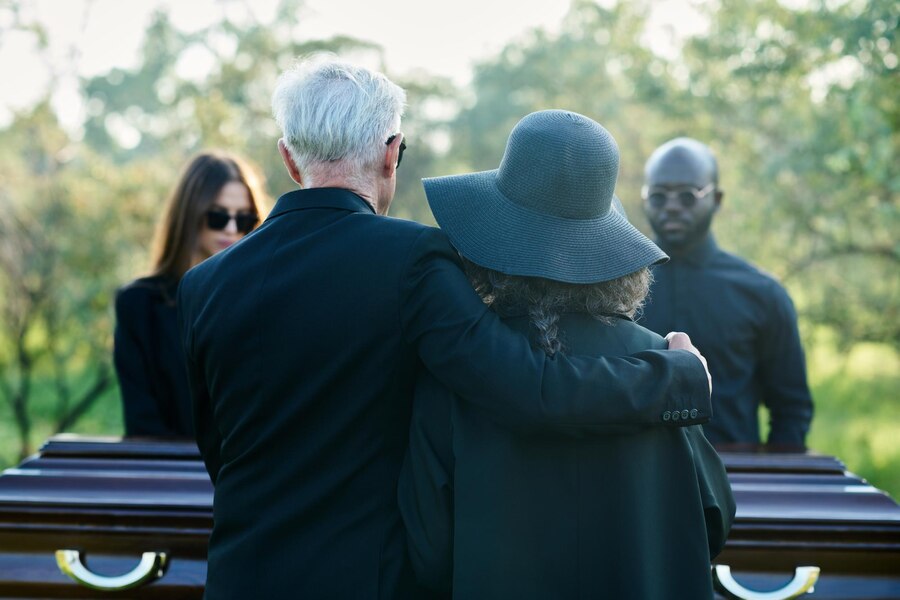 Rear View Mature Grey Haired Man Embracing His Wife Black Hat